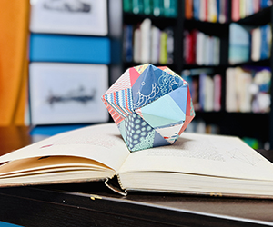 Where Divine Proportion Becomes a Star (Stellar Octahedron on Luca Pacioli's De Divina Proportione) Polyhedra Origami